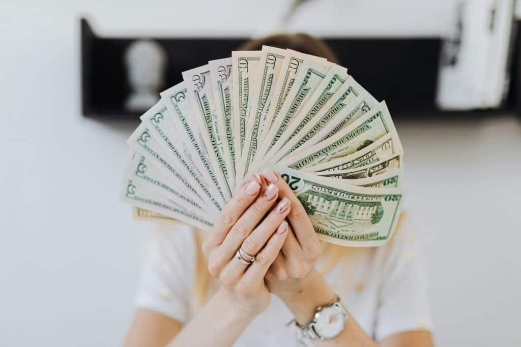 Small business owner analyzing cash flow and funding options