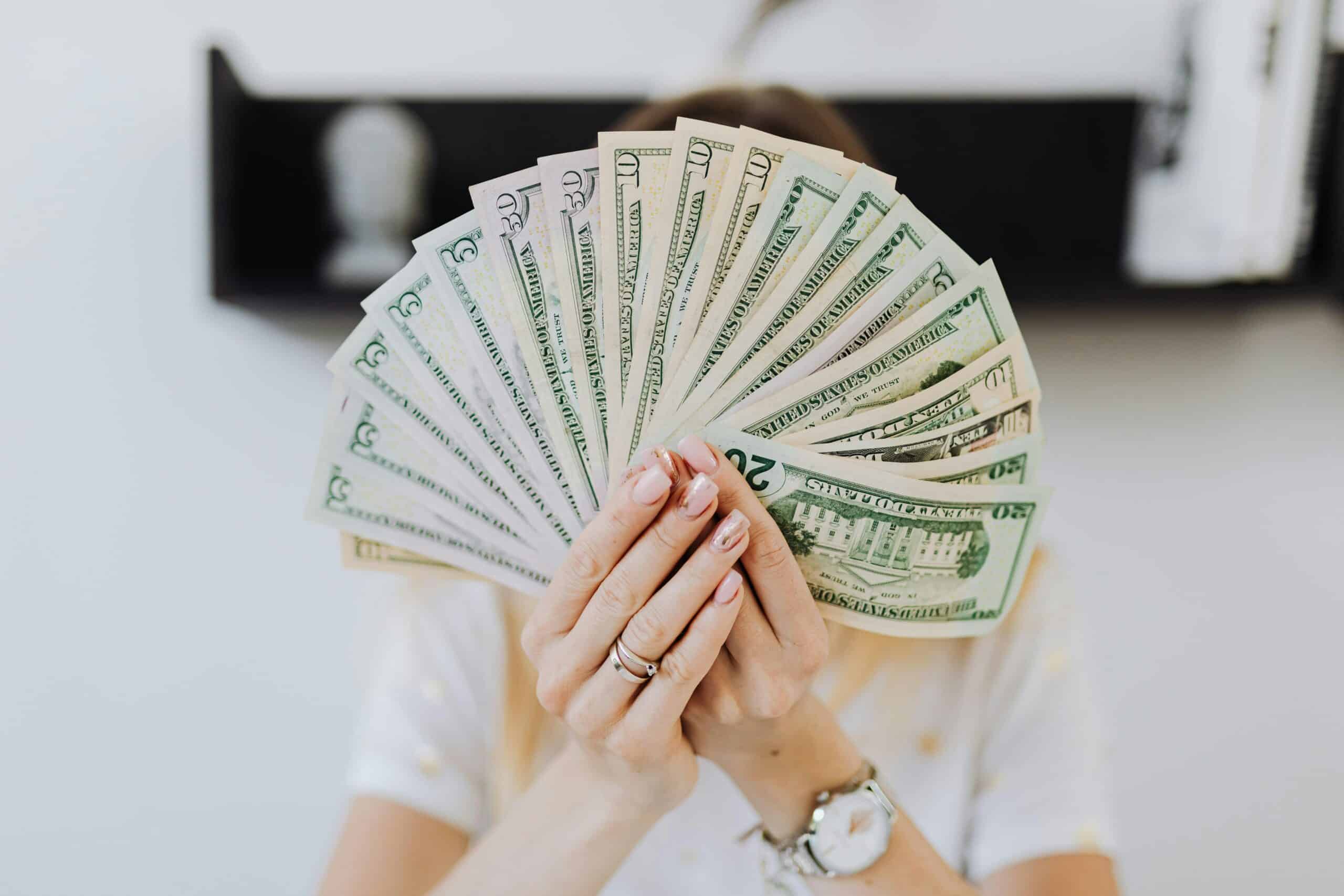 Small business owner analyzing cash flow and funding options